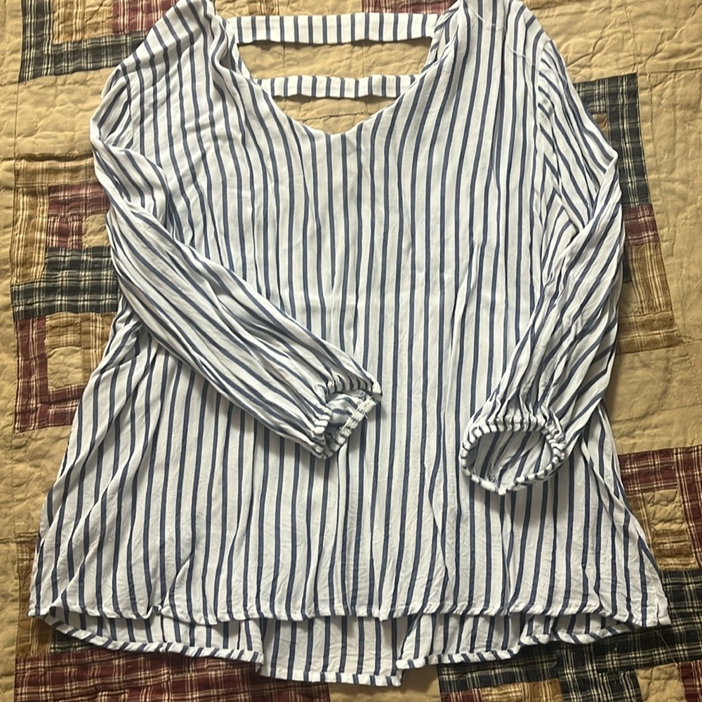 White and blue striped blouse with back detail.